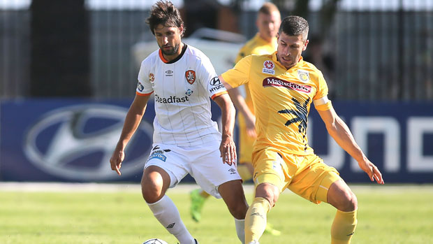 Thomas Broich controls the ball in front of Mariners Captain Nick Montgomery.
