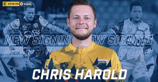 Chris Harold signs on the Central Coast